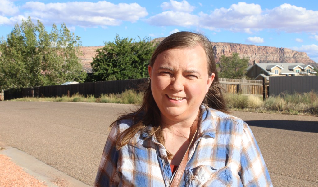 a woman in a plaid shirt