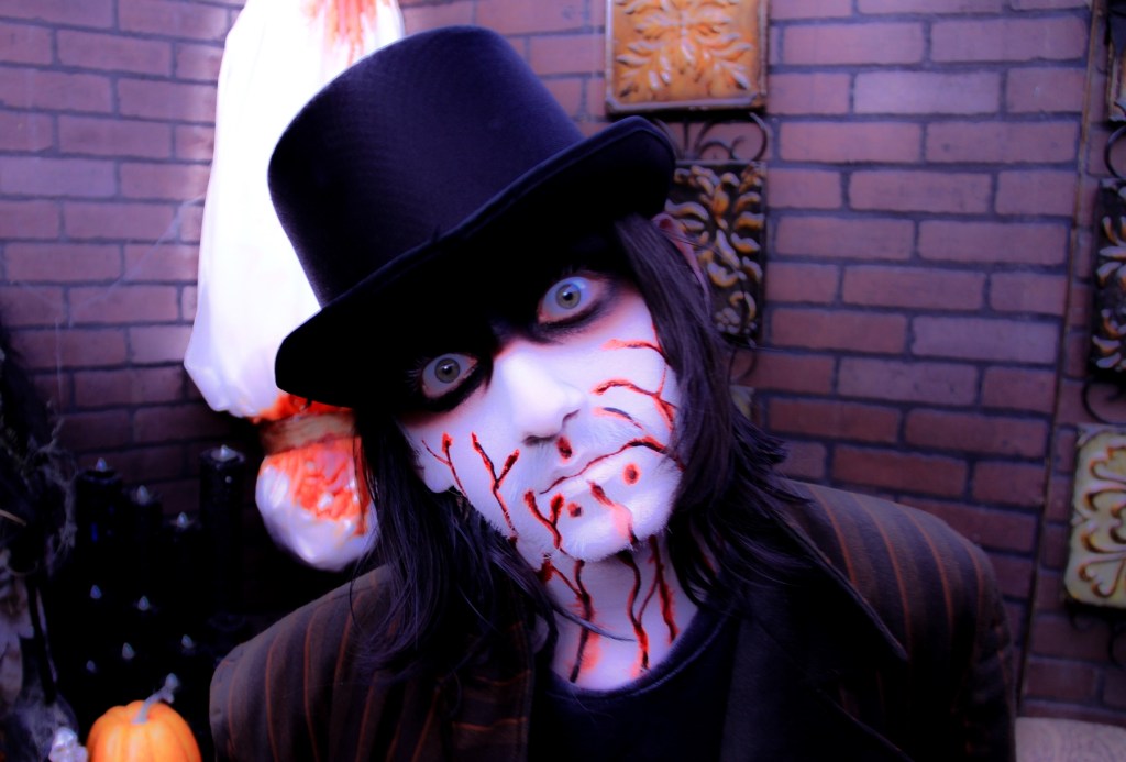 A ghostly man at a haunted house.