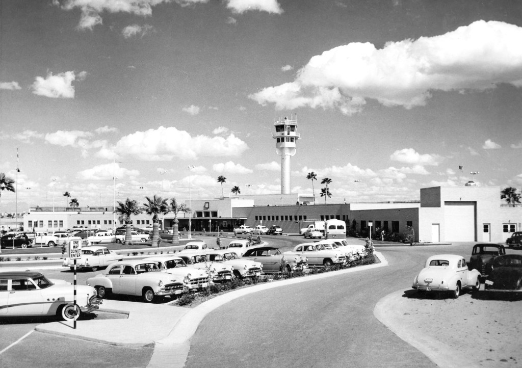 A vintage photo of Phoenix Sky Harbor Airport's Terminal 2 and parking lot.