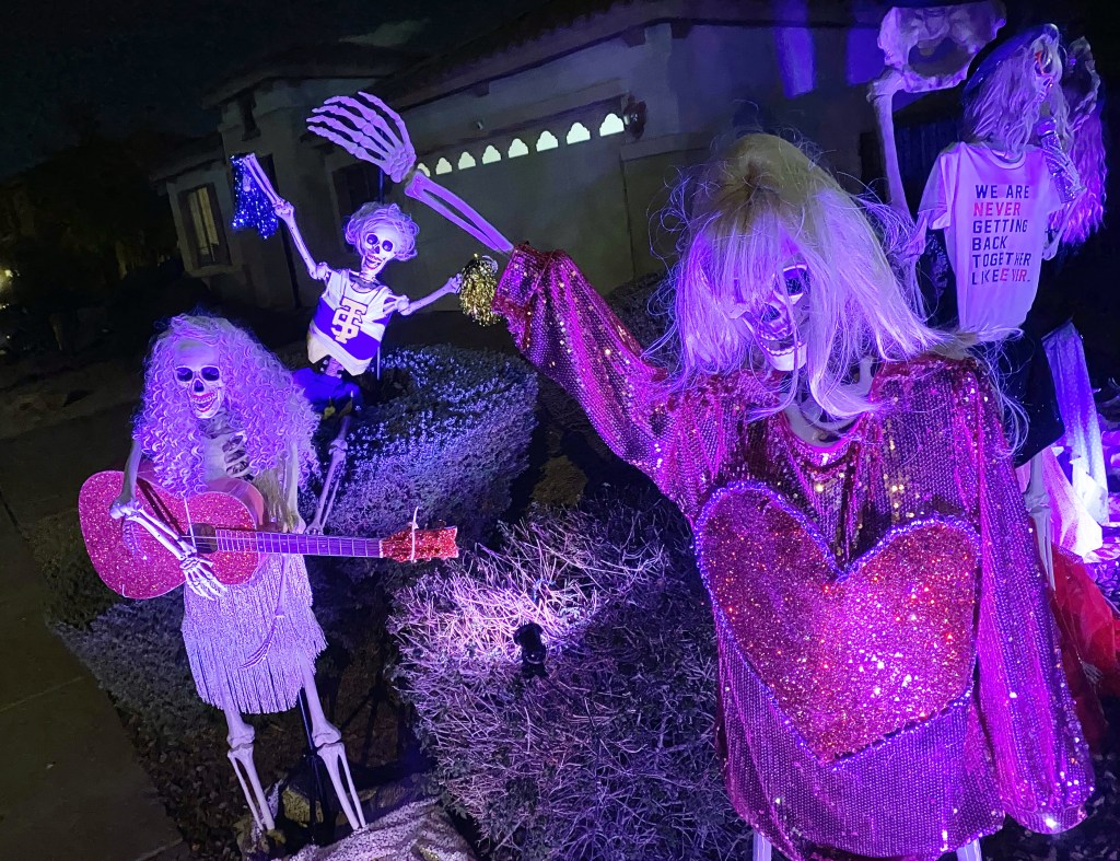 Skeletons dressed like Taylor Swift.