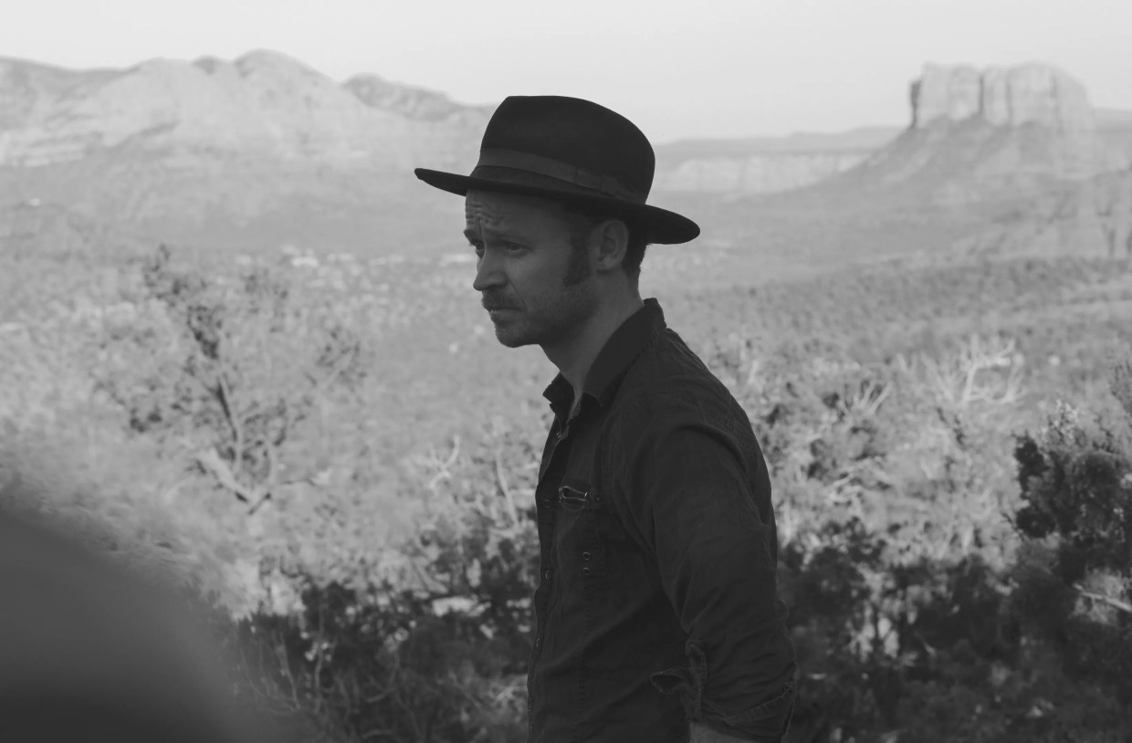 decker. Makes a Bold Political Statement on <i>Into The Red</i>