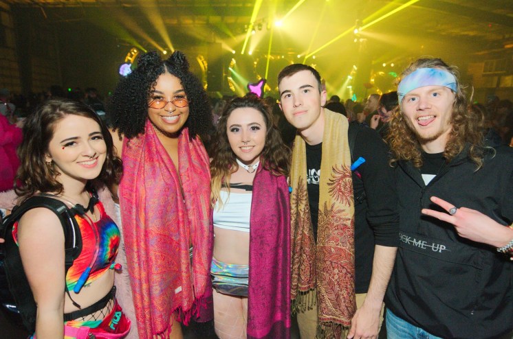 EDM fans at a dance party event.