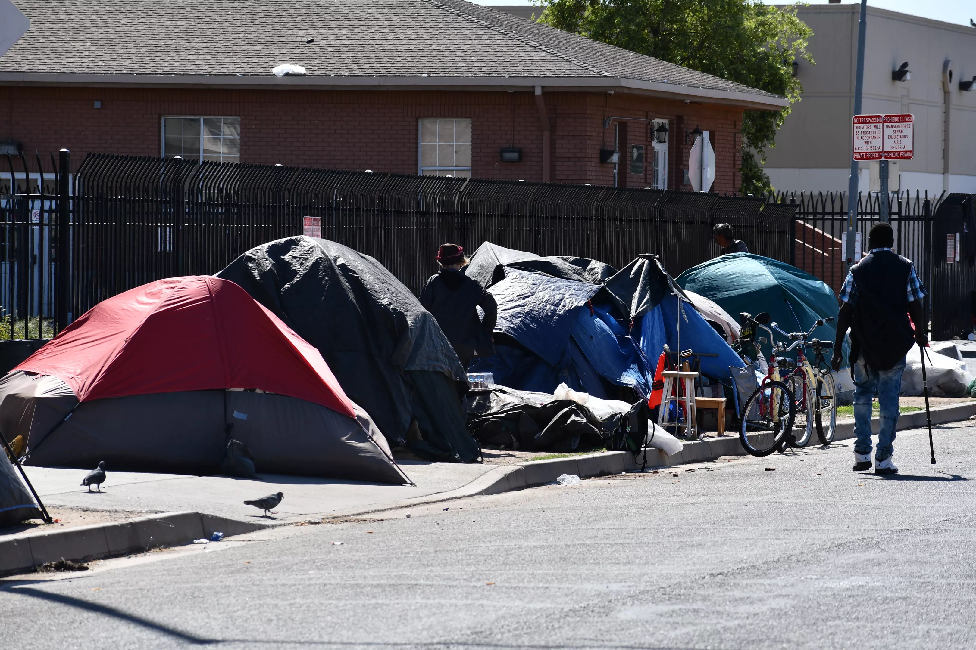 Homeless people live in tents along Madison Street
