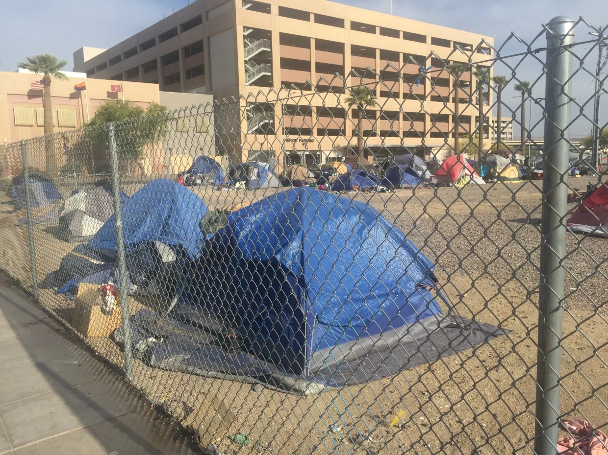Maricopa County Starts Closing Controversial Homeless Camps on Parking Lots