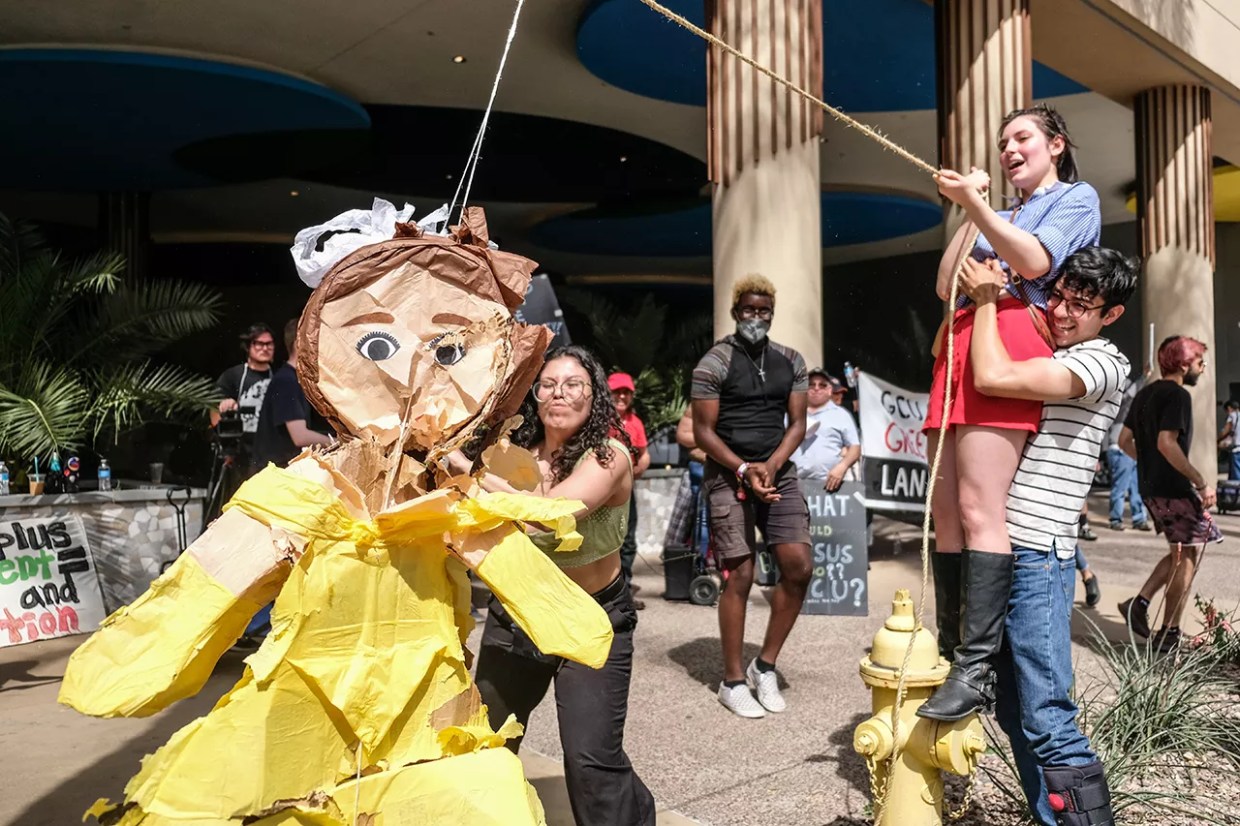 Protesters Beat a Piñata to Remind Phoenix Mayor of Controversies She Ignores