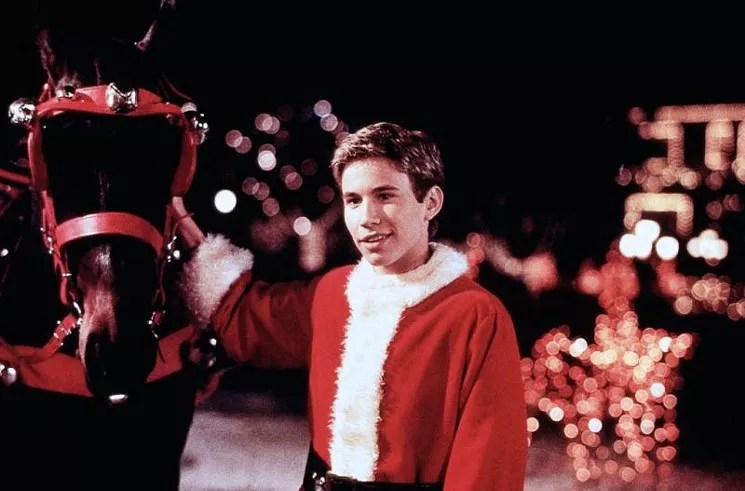 Actor Jonathan Taylor Thomas in a Santa suit.