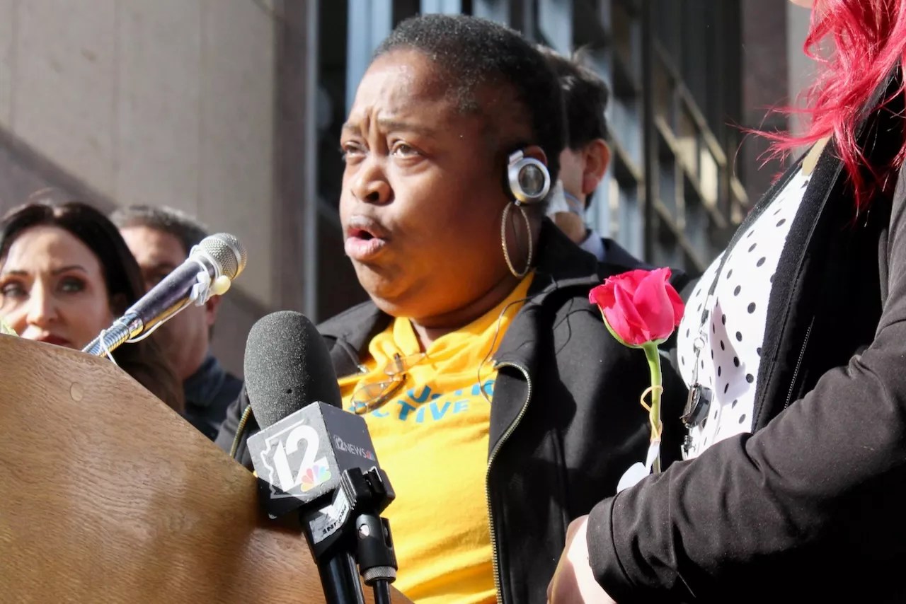 Mussallina Muhaymin speaking at press conference