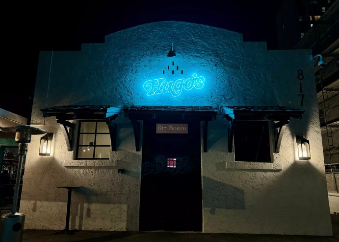 Hugo's Cantina exterior sign.
