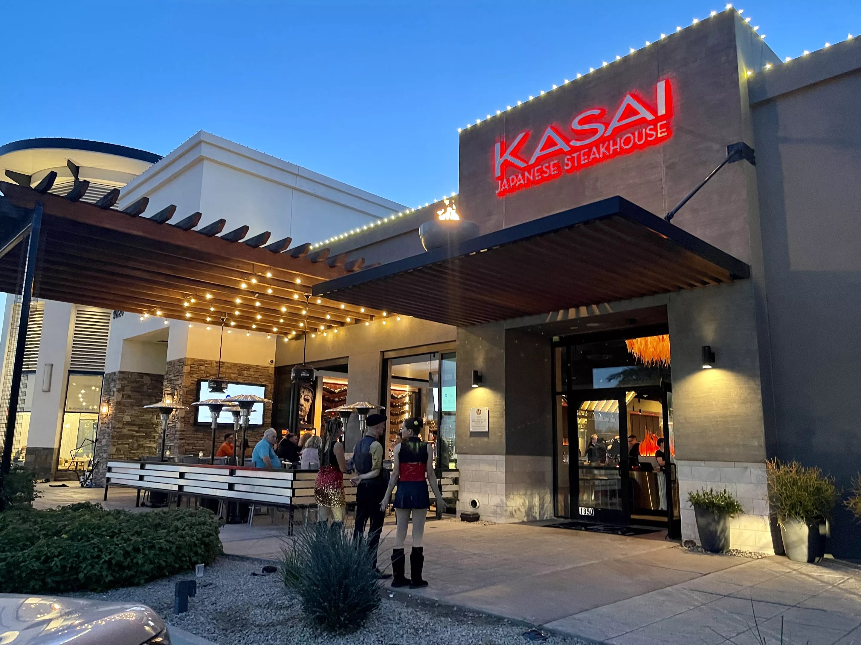 Exterior of Kasai at night.