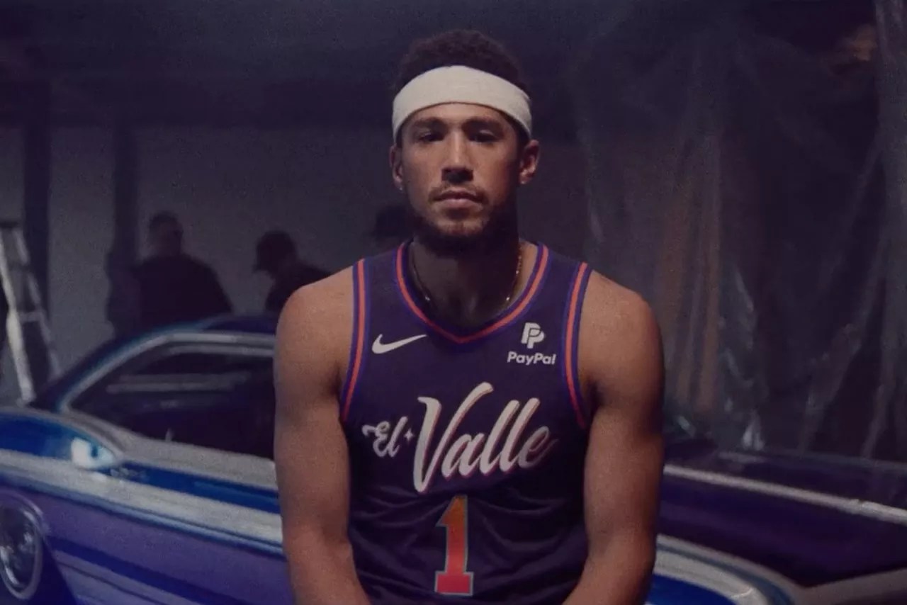 Devin Booker wearing El Valle jersey