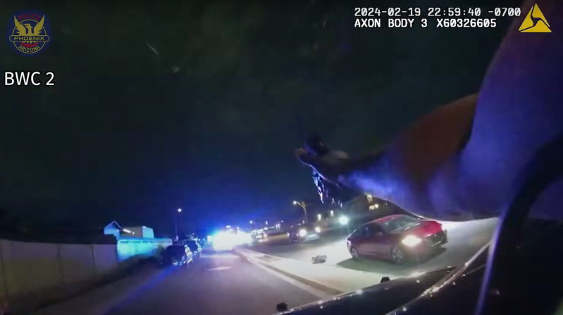 Phoenix police officer with gun