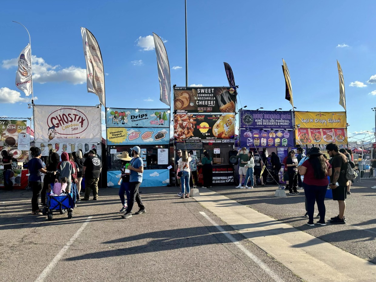Vendor stands at FoodieLand Phoenix.