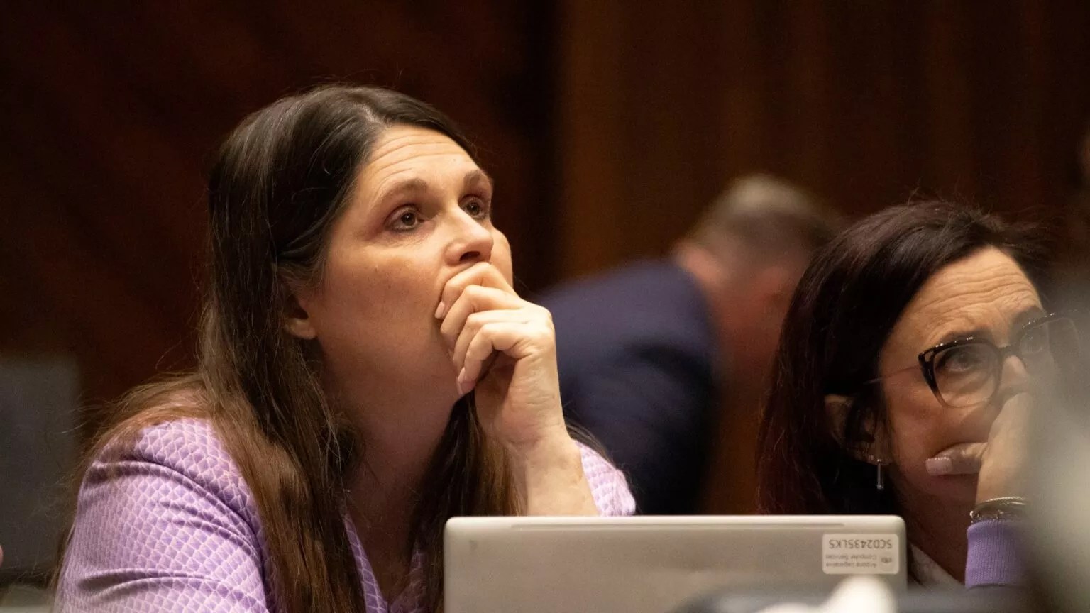 Rep. Stephanie Stahl Hamilton, D-Tucson, watches with her hand on her chin as voting proceeds on her House Bill 2677, which repeals a near-total abortion ban that was recently upheld by the Arizona Supreme Court.