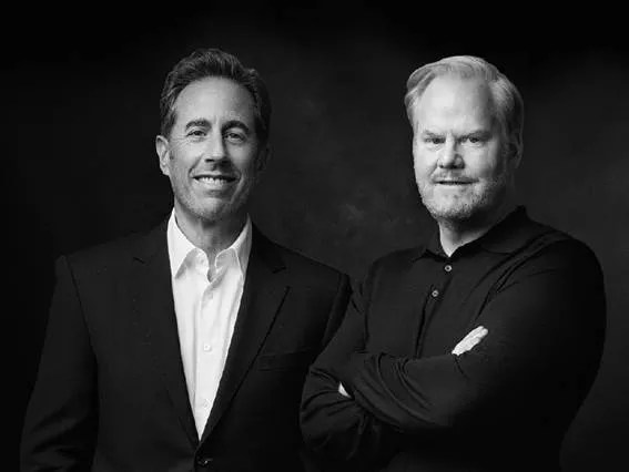 Two middle-aged white men photographed in black and white.