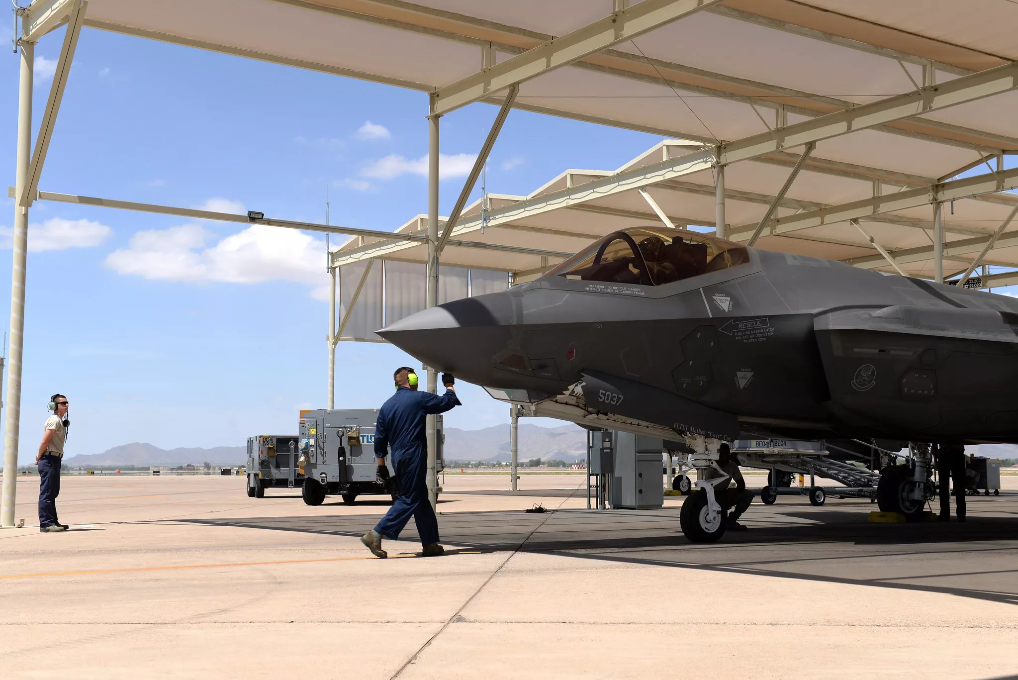 61st Aircraft Maintenance Unit maintainers inspects an Lockheed Martin F-35A Lightning II "Joint Strike Fighter" (sn 11-5037) (MSN AF-48) prior to its taxi-out and takeoff July 18, 2018, at Luke Air Force Base, Ariz. Pilots and maintainers perform thorough pre-flight checks before each sortie.