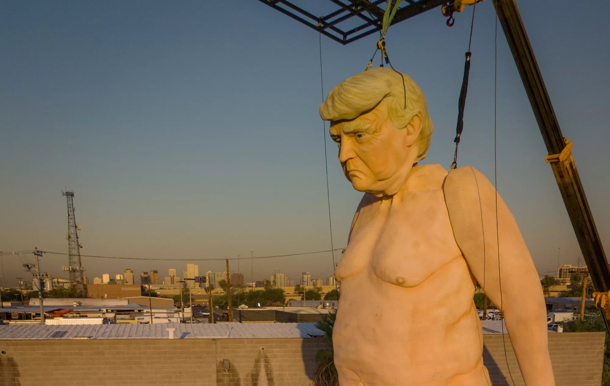 a naked trump statue