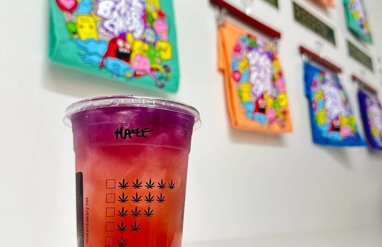 a red and orange drink on a counter