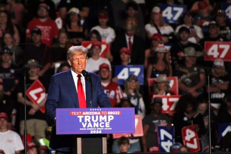 donald trump in front of a crowd