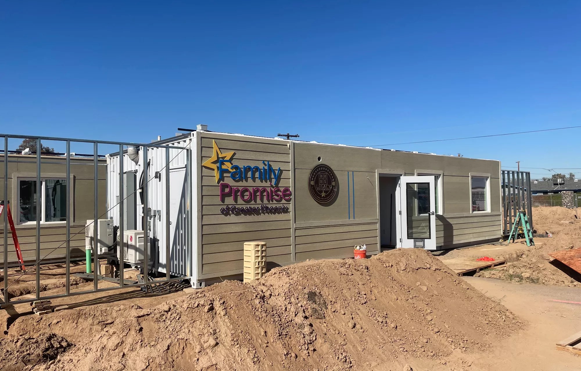 a shipping container retrofitted to be a dwelling