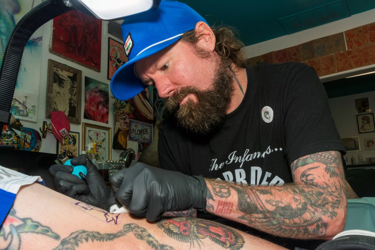 Rattlesnake Romance Tattoo serves up cool ink and a spirit of community
