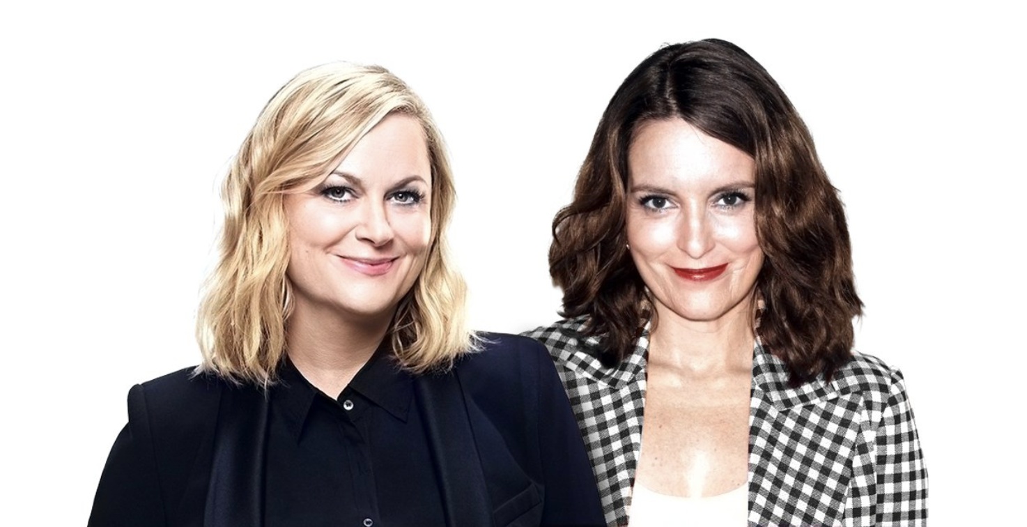 Two white women posing for the camera.