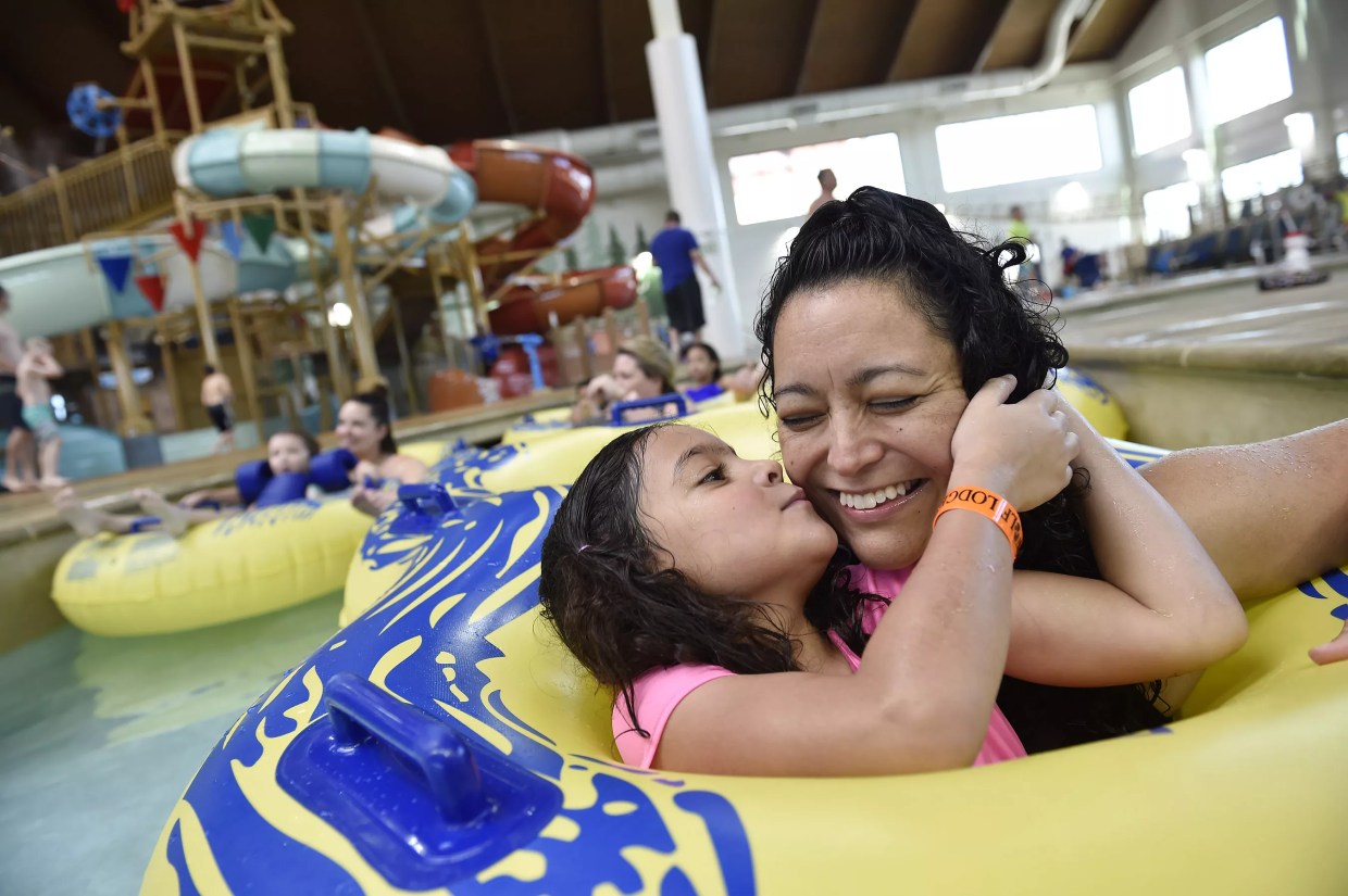 A mother and child at a waterpark.