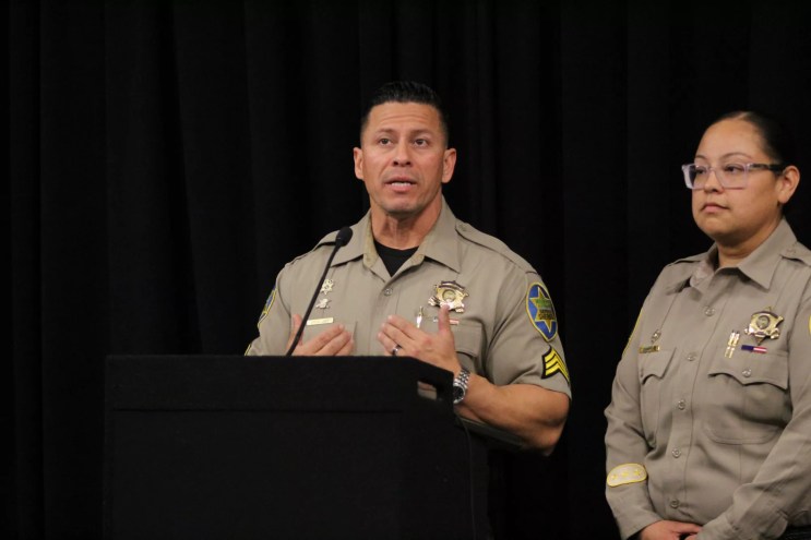 two sheriff's office employees in uniform
