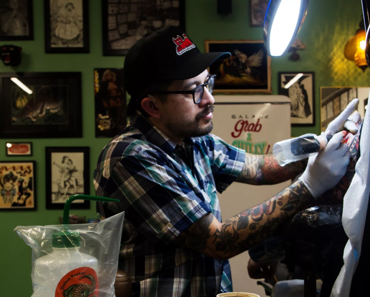 Phoenix tattoo artist Paulski blends traditional methods, modern designs