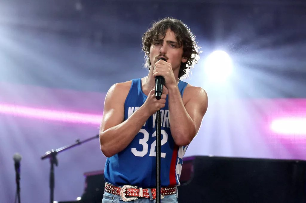 Singer Benson Boone performs at a festival.