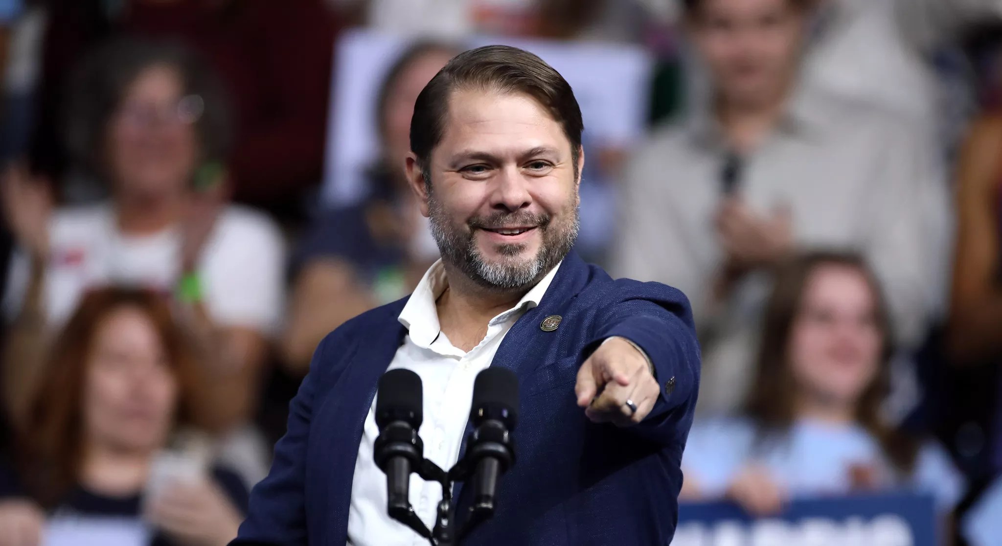 ruben gallego pointing at a rally