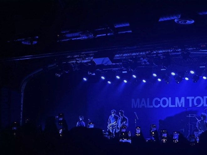 Band performs on stage