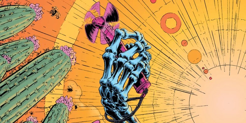 a skeleton hand holds a portable fan in the sun