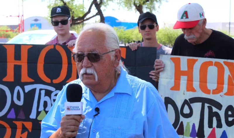 salvador reza at a protest