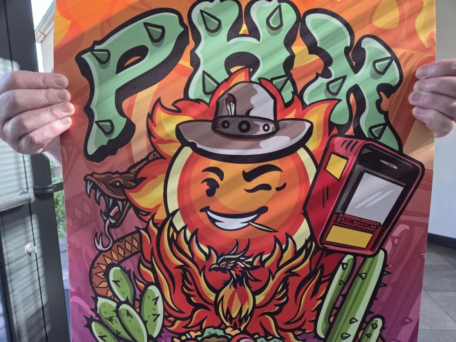 a photo of a street-art-style poster with phoenix iconography