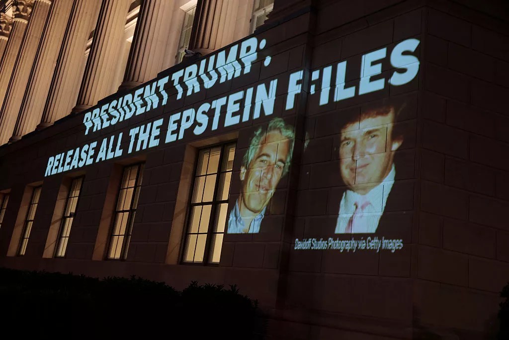 An image of Donald Trump and Jeffrey Epstein, along with the words “President Trump: Release All the Epstein Files,” is projected onto the U.S. Chamber of Commerce building on July 18.