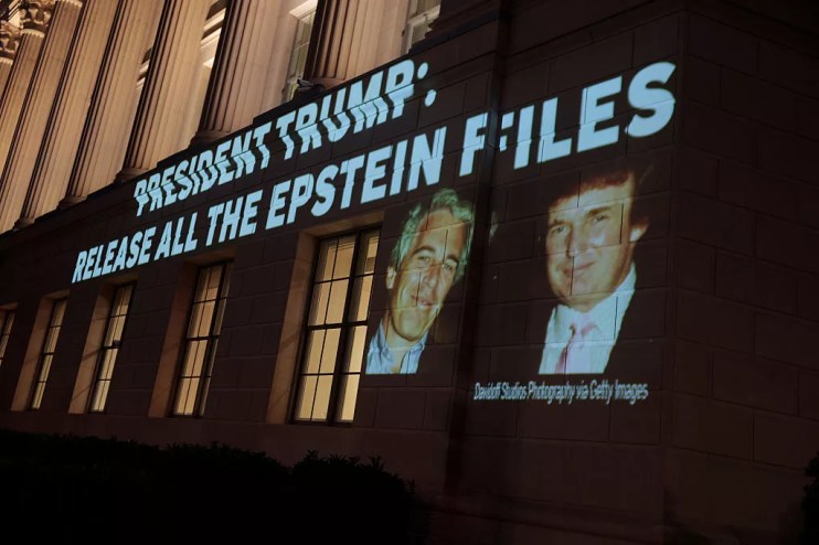 An image of Donald Trump and Jeffrey Epstein, along with the words “President Trump: Release All the Epstein Files,” is projected onto the U.S. Chamber of Commerce building on July 18.