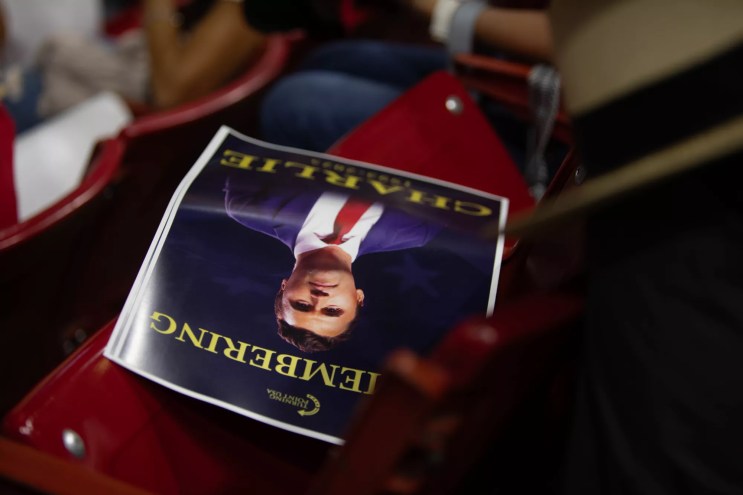 a program left on a seat for the vigil for charlie kirk